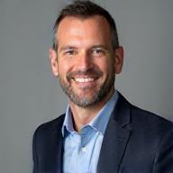 Professional headshot of Alex Johnson, CEO of SummitPoint Solutions.